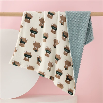 Dwuwarstwowe koce Minky w kropki